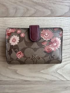 COACH 二つ折り財布 シグネチャー 花柄のサムネイル