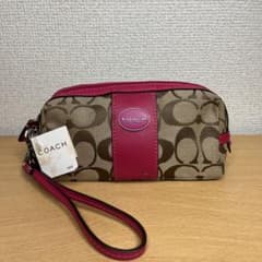 COACH コーチ シグネチャー ピンク ラウンドファスナー ポーチのサムネイル