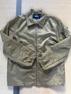[美品]STUSSY ストゥーシー ミリタリージャケット　ゴールド　Sサイズのサムネイル