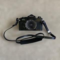 Canon F-1 前期モデル 28mm 3.5レンズ カメラケース、説明書付き Canon F-1 前期モデル 28mm 3.5レンズ カメラケース、説明書付き