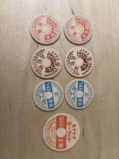 牛乳瓶の蓋 7枚セットのサムネイル