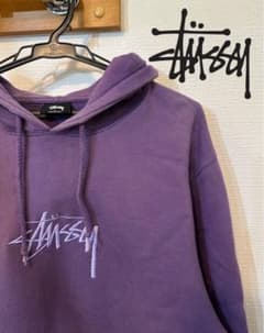 希少】STUSSY パープル フード付きパーカー - メルカリ
