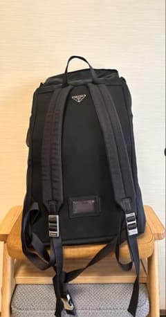 美品希少】PRADA バックパックV136 三角ロゴプレート - メルカリ