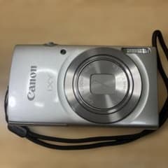 Canon IXY180 with battery, charger, and tripod.