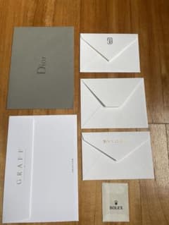 カルティエ　GRAFF BVLGARI Dior ブシュロン　ROLEX 封筒他