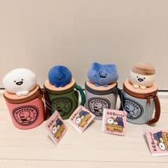 문구와 함께 머그컵 파우치 봉제인형