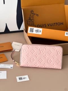 Louis Vuitton ピンク 長財布 エンボス加工 - メルカリ