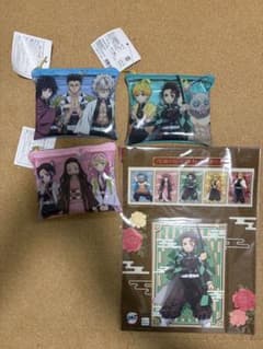 【新品未開封】鬼滅の刃 フラットポーチ3種　シール・ポストカード5枚セットのサムネイル