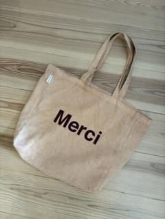 Merci 初期トートバッグ ベージュ(ライトブラウン)カラー タグ付きのサムネイル