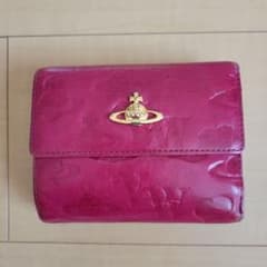 ヴィヴィアン・ウエストウッド　ピンクレザー三つ折り財布　中古のサムネイル