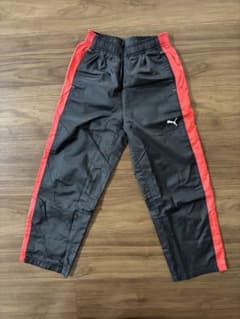 Puma ジャージパンツ 黒/赤のサムネイル