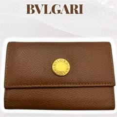 特価 ブルガリ キーケース 20235 色:AMBER/GOLD-ブラウン BVLGARI】ブルガリ 6連キーケース シボ革 ブラウン ゴールドロゴ 本革