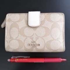 COACH 2つ折り財布(ベージュ)のサムネイル