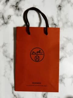 HERMES オレンジ ロゴ入り紙袋 HERMES ショップ袋 紙袋 オレンジ - メルカリ