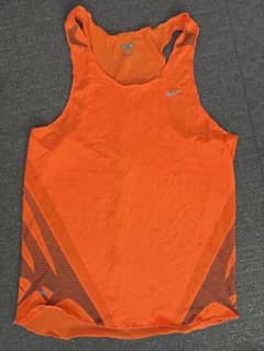 国内未発売 海外限定 NIKE ランニングシングレット オレンジ S - メルカリ