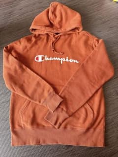 Champion オレンジ パーカー Lサイズのサムネイル