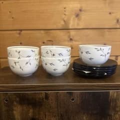 Set of 5 teacups with saucers