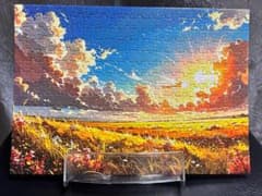 ジグソーパズル 夕焼けの草原と入道雲のサムネイル