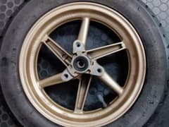 HONDA　af35ディオZX　フロントホイール タイヤ付のサムネイル