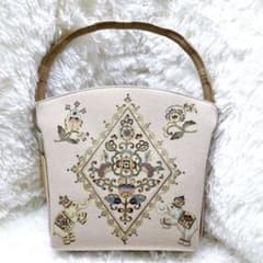 未使用品】岡重 オカジマ 皇室御用達 和装バッグ 絹100% 象 花柄