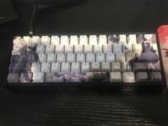 Gaming keyboard with rapid triggers