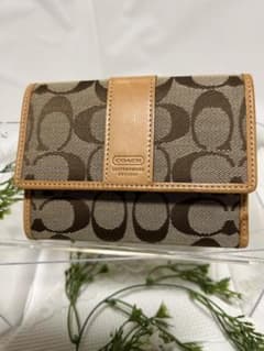 #コーチ　COACH  2つ折れ財布　札入れ　小銭入れ　ユーズド品のサムネイル