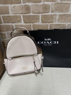 COACH ピンクホワイト リュック - メルカリ