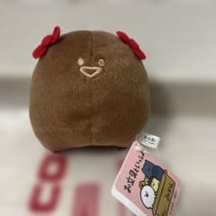 초콜릿 컬러 봉제 인형 문구와 함께 젤리 씨