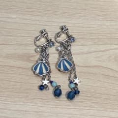 Anna Sui earrings and other accessories set for sale.