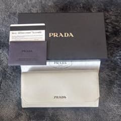 PRADA 長財布 アイボリー 未使用 箱保証書あり - メルカリ