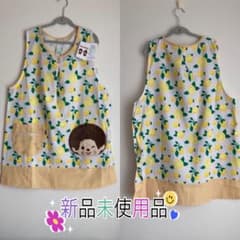 新品】❤︎モンチッチエプロン保育士❤︎レモン総柄ホワイトサイズM