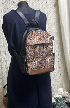 60925Aミナペルホネンハーフハンドメイド本革リュック - メルカリ