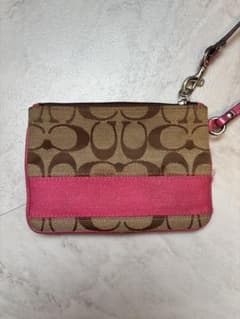 COACH コーチ シグネチャー ポーチ リストレット ピンク - メルカリ
