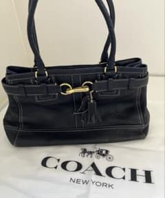 COACH レザー ハンドバッグ ブラック タッセル付き - メルカリ