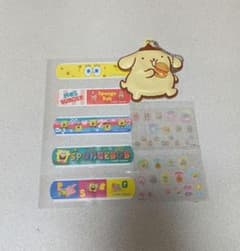 SpongeBob bandages, Pompompurin keychain, Sumikkogurashi nail stickers