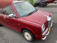 最終値下げ！ミラジーノ型光岡レイタイヤホイールキャップ付き！155/65 R13のサムネイル