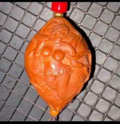 Olive wood carving art, lucky charm, netsuke, erotic painting, female genitalia, high-quality wood carving, handmade.
