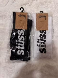 STUSSY ロゴソックス 靴下 2足セット 黒 白 メンズ レディースのサムネイル