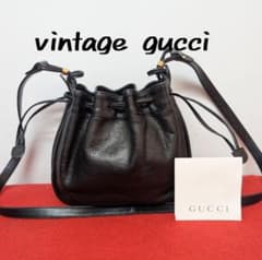 希少 GUCCI 巾着型 レザー ハンドバッグ ロゴ リング ブラック バケツ型 希少 GUCCI 巾着型 レザー ハンドバッグ ロゴ リング ブラック