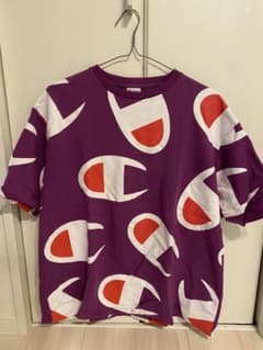 Champion 総柄ロゴ Tシャツ パープルのサムネイル
