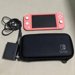 わ*ん様 Nintendo Switch Lite Coral 本体　純正ケース Nintendo Switch Lite Coral 本体 純正ケース - メルカリ
