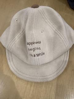 「happiness begins with a smile」キャップのサムネイル