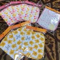 新品未開封　お食事エプロン7枚セットのサムネイル