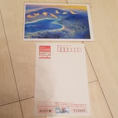 佐渡の景色の水彩画ハガキと未使用おむすび丸年賀ハガキのサムネイル