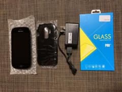 docomo SIMフリー　F-04J らくらくスマートフォン　ブラック　中古のサムネイル