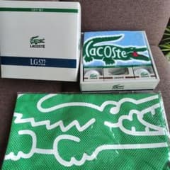 【非売品】LACOSTE　タオル付きゴルフボールギフトとメッシュ巾着袋のセット 非売品】LACOSTE タオル付きゴルフボールギフトとメッシュ巾着袋の