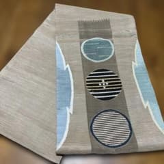 夏帯　ベージュ 丸紋 モダンデザイン　正絹のサムネイル