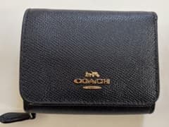 coach ネイビー　三つ折り財布のサムネイル