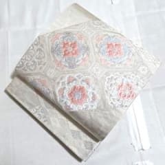 6k391 袋帯 絹 正倉院文様 華文 唐織 ペイズリー 橙色 花柄 和装 着物