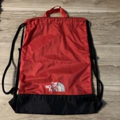 THE NORTH FACE ナップザック 赤/黒のサムネイル